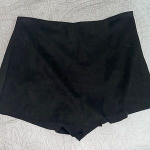 Vestique- Black Asymmetrical suede skort